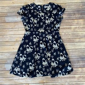 Tulle - Fit and Flaire “Bow” dress.